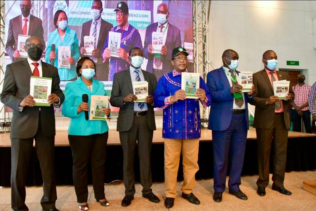 MOEF CS Keriako Tobiko launching books during the conference